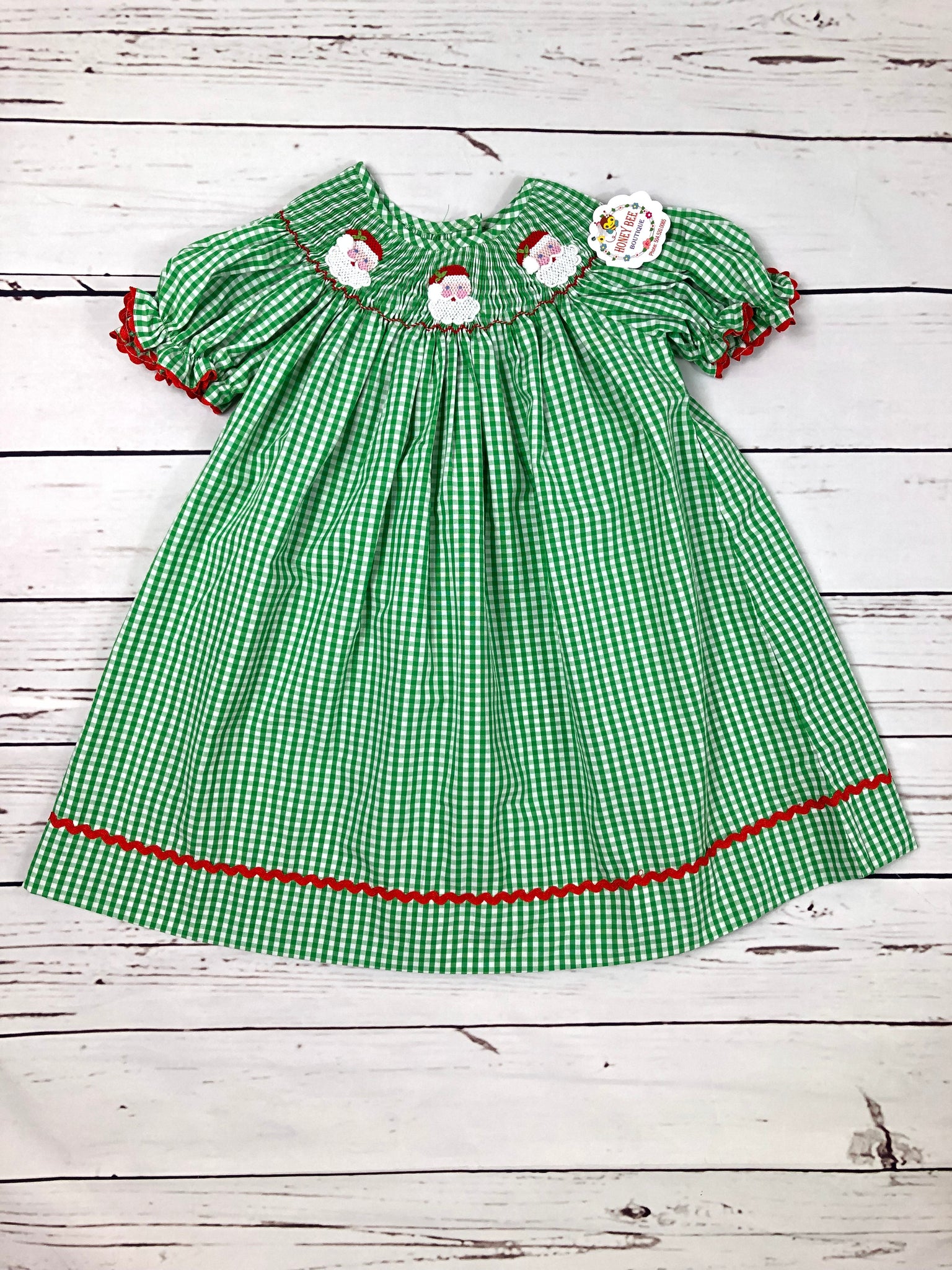 Bright green Santa Claus smocked dress Honey Bee Smocked Boutique Bright green Santa Claus smocked dress Honey Bee Smocked Boutique
